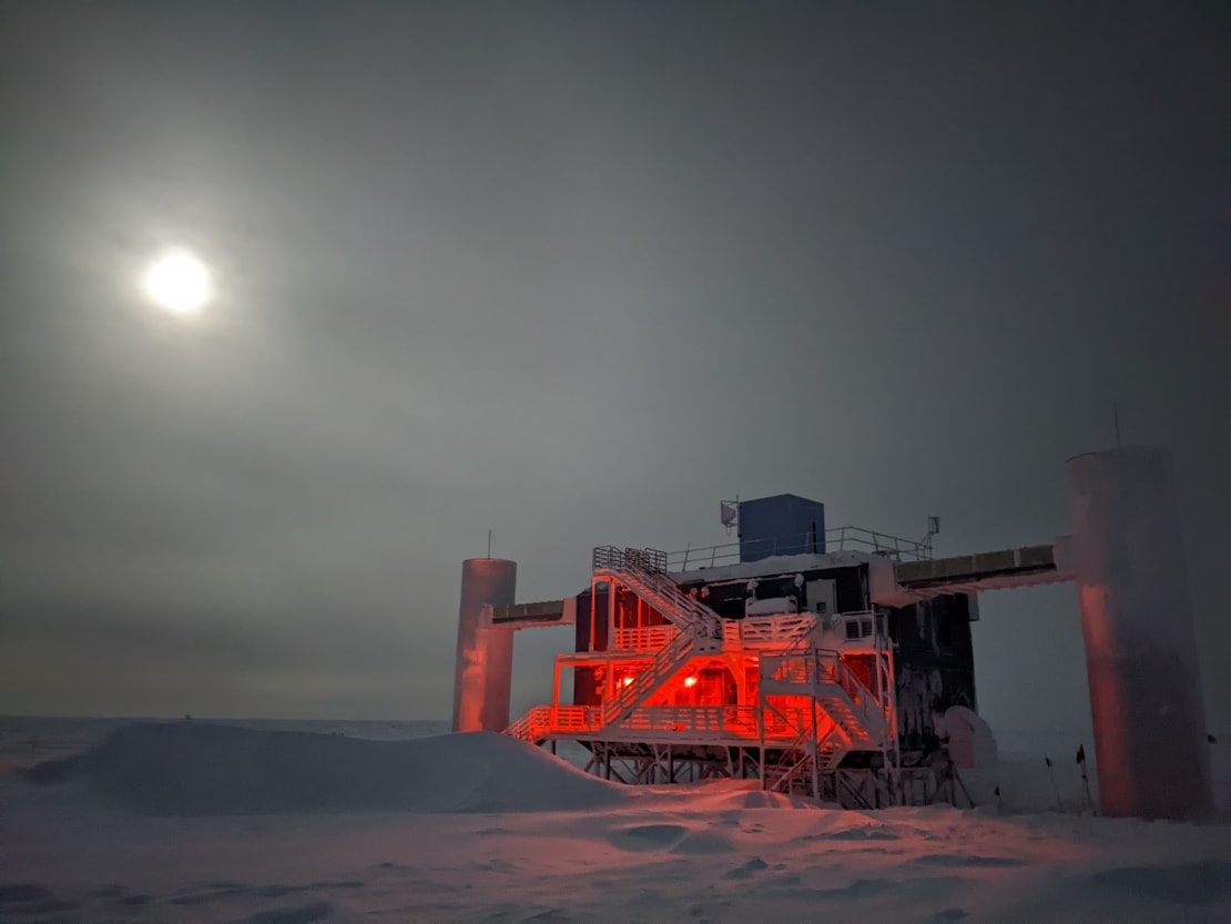 Full moon and cloudy sky over the IceCube Lab.