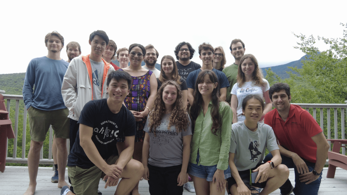 A group of people posing outside