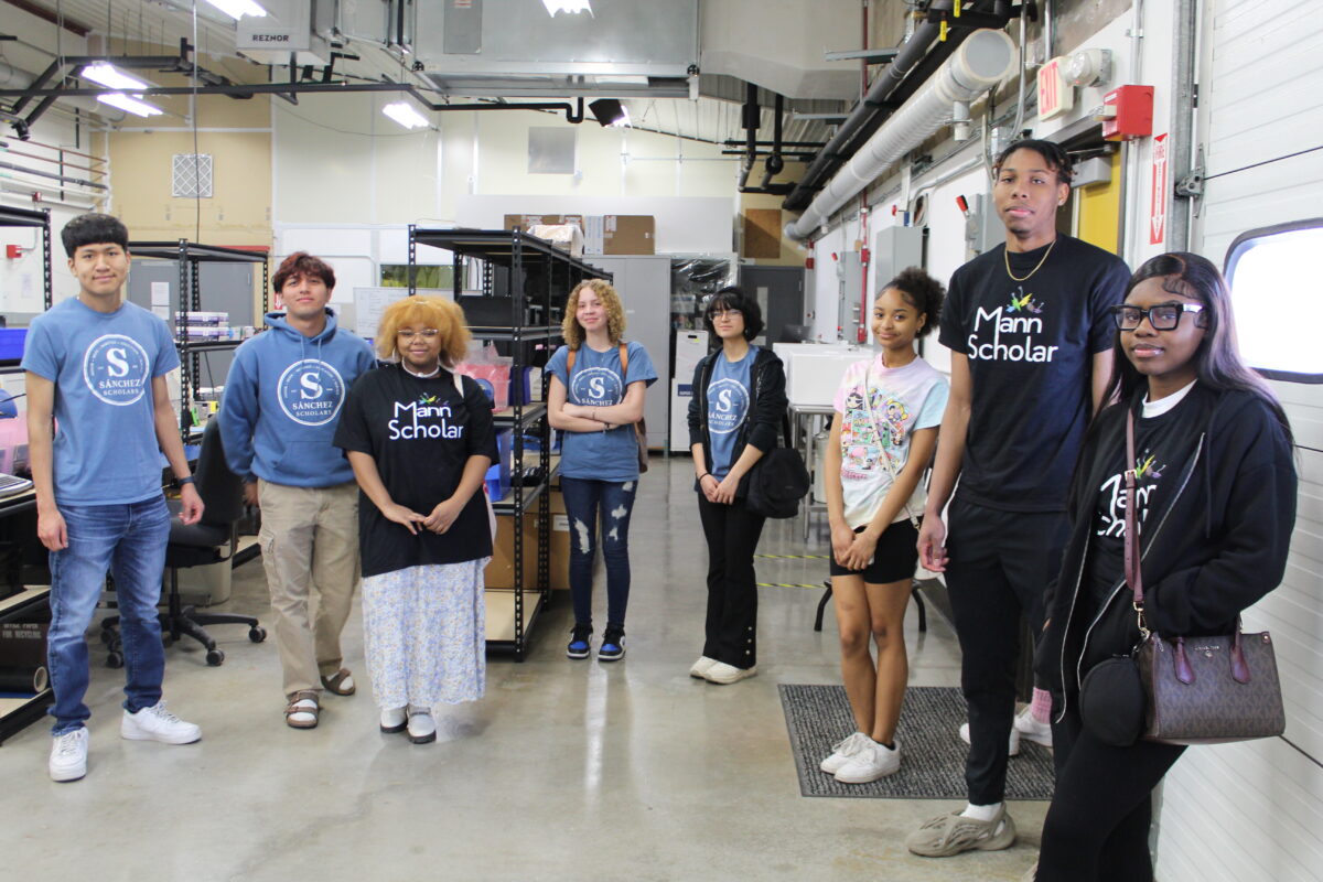 A group of people inside of a lab