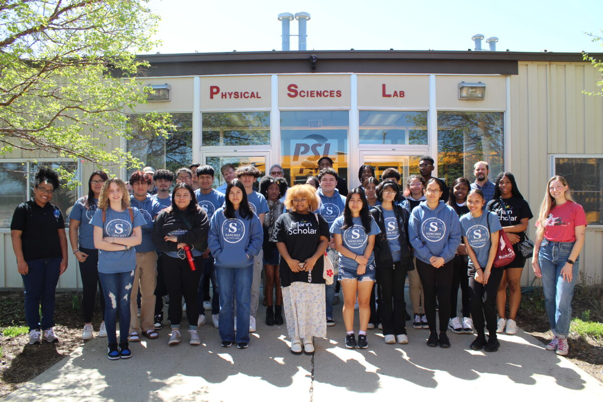 A group of people in front of a building outside