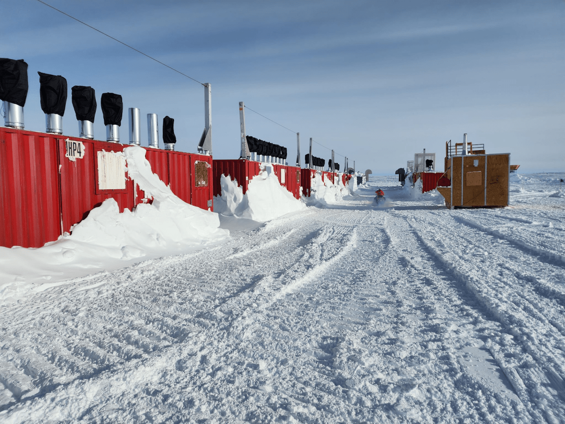 A red building that had snow plowed from it