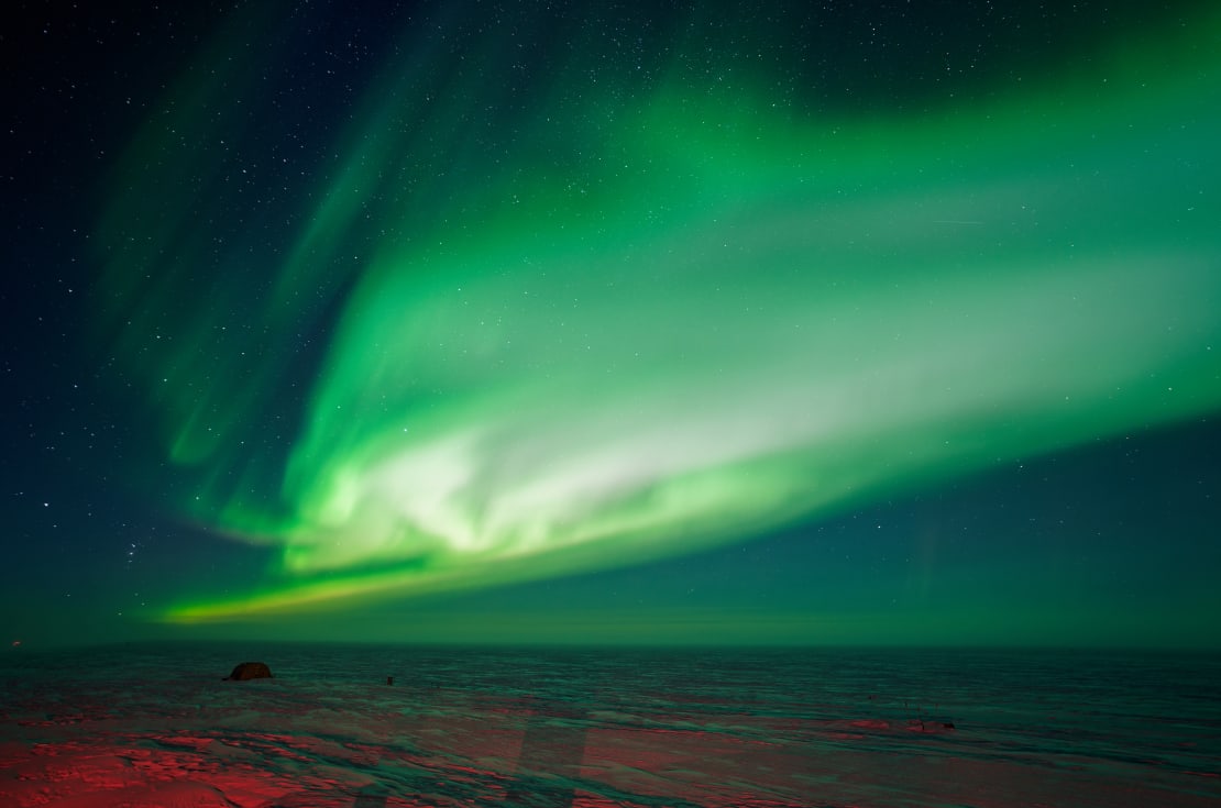 Bright green auroras filling the skies.