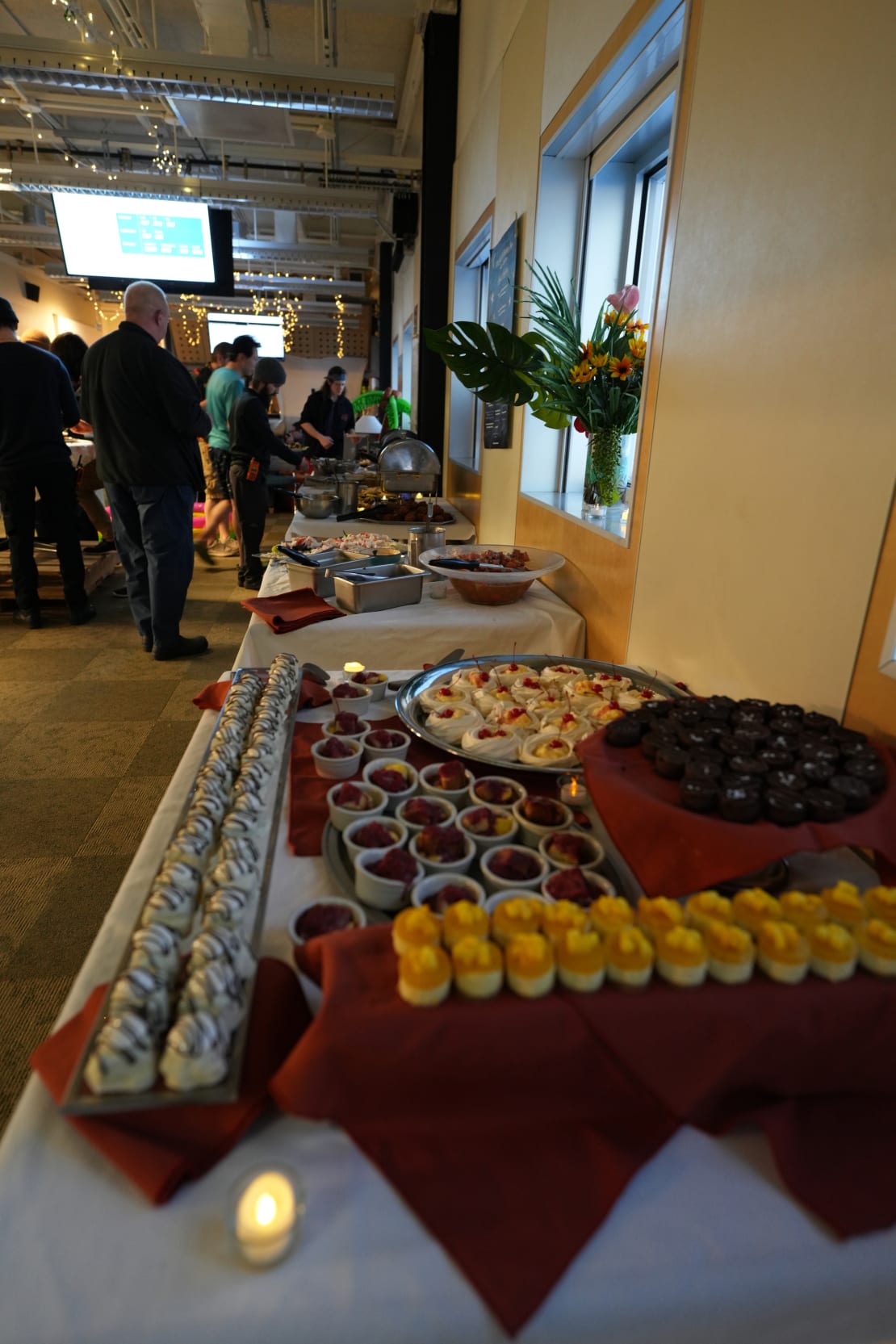 Long view of plates of food set out for a buffet dinner at the South Pole.