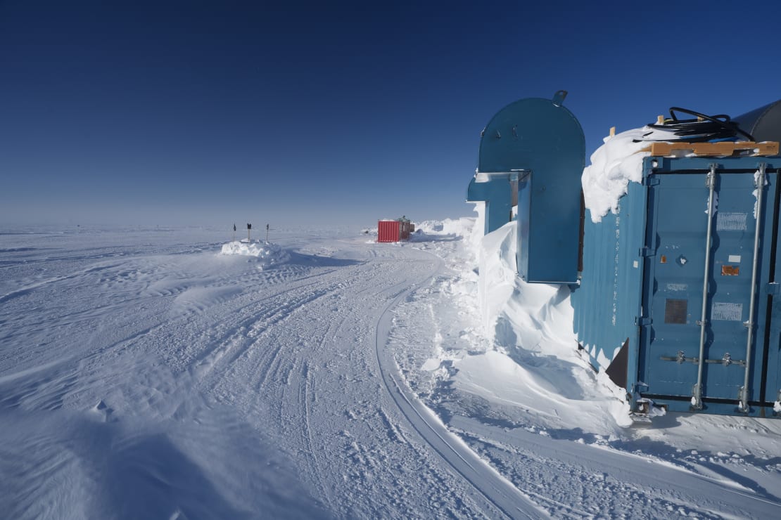 View of groomed path around drill camp.