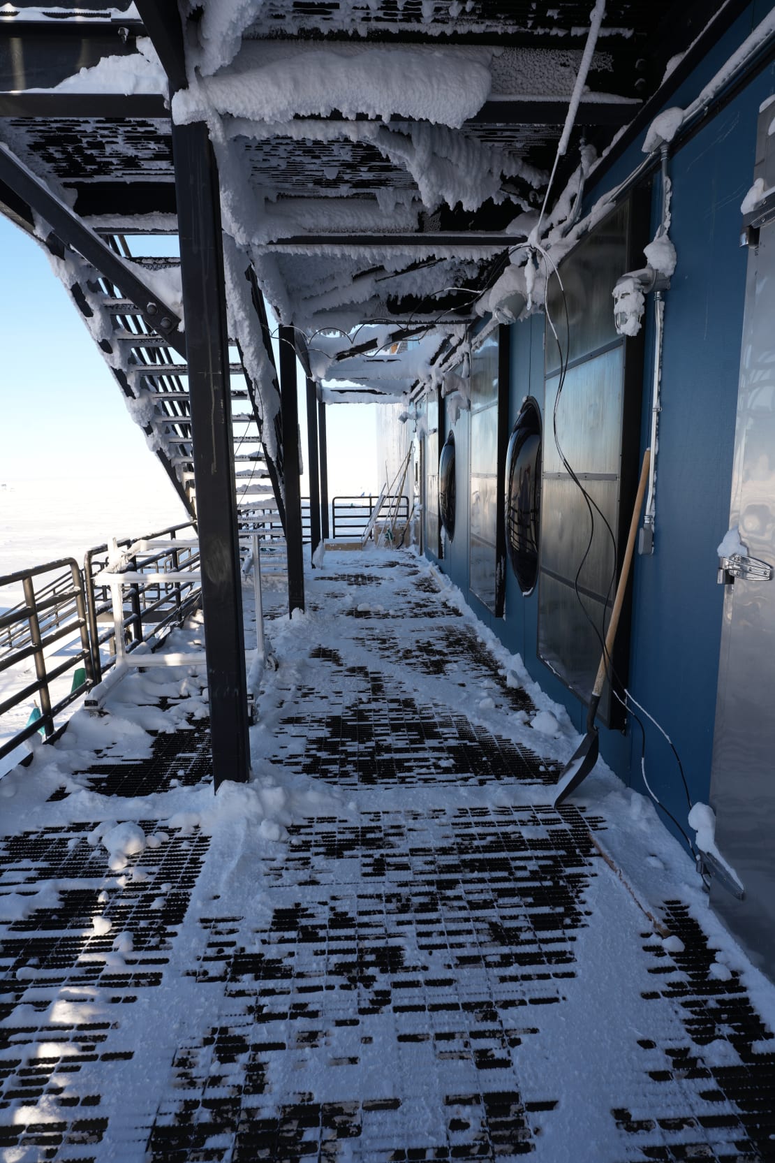 Long view of an IceCube Lab deck freshly cleared of accumulated snow.