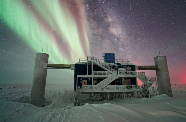 Auroras and the Milky Way in sky above the IceCube Lab.
