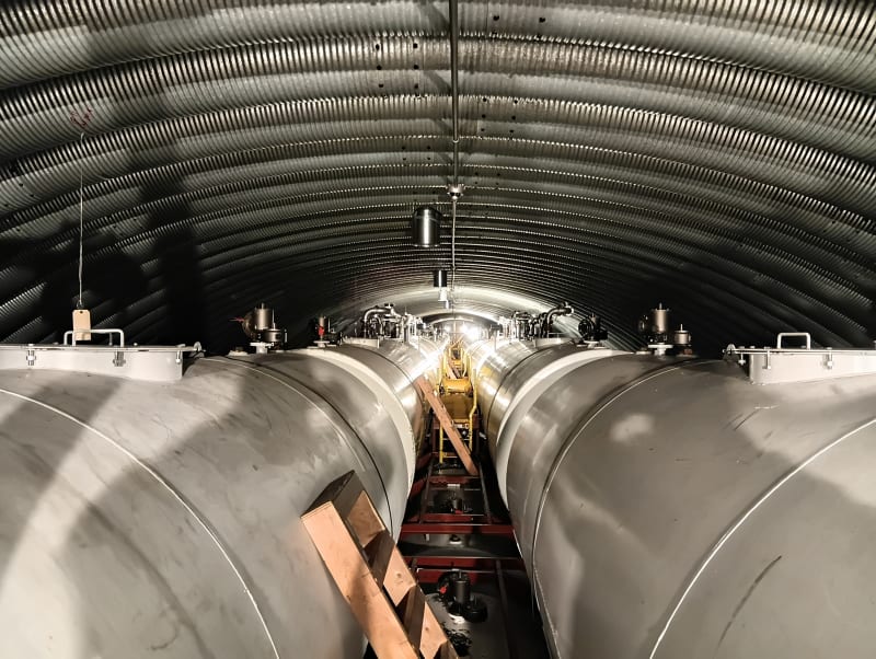 Long view of large fuel tanks in the underground arch at the South Pole