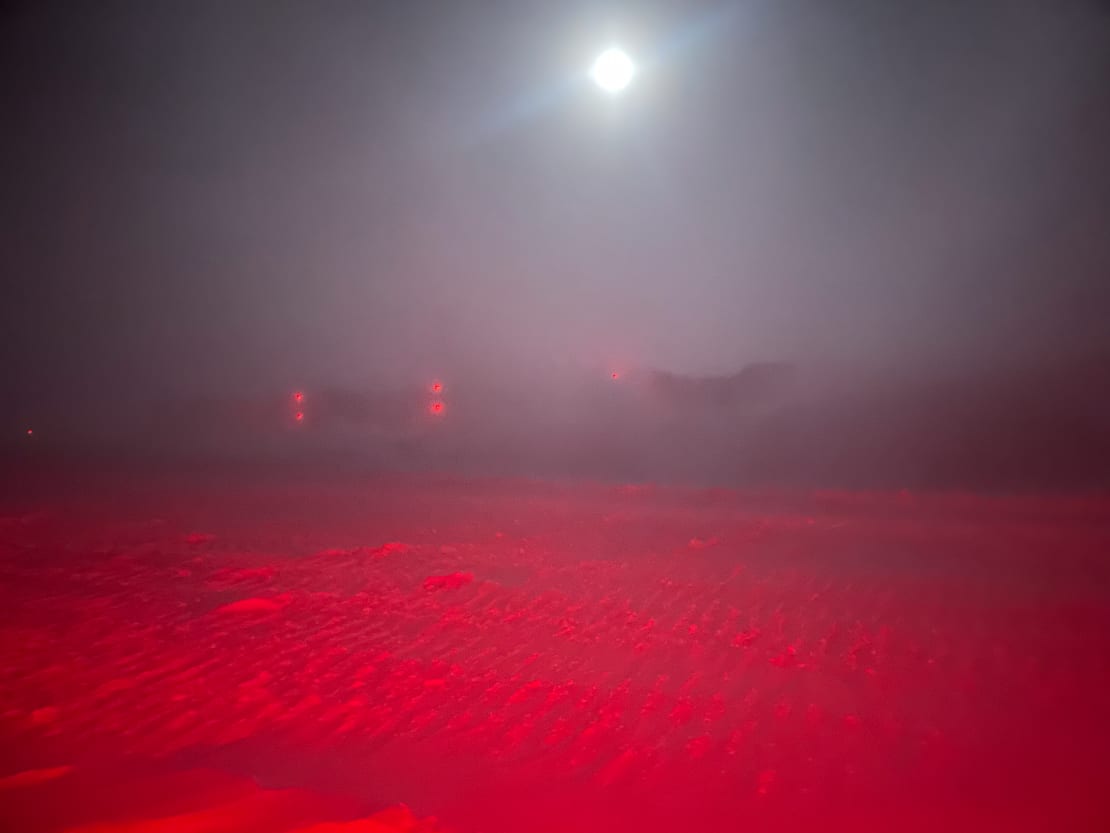 Low visibility at the South Pole in winter under bright moon.