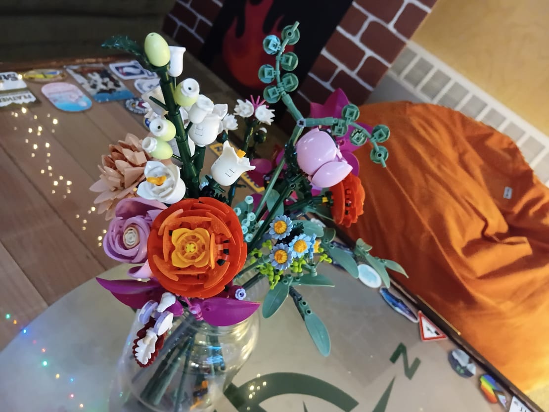 Close-up of a plastic-construction floral arrangement.